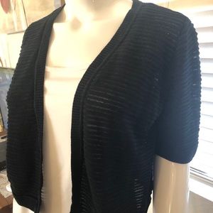 AB Studio shrug